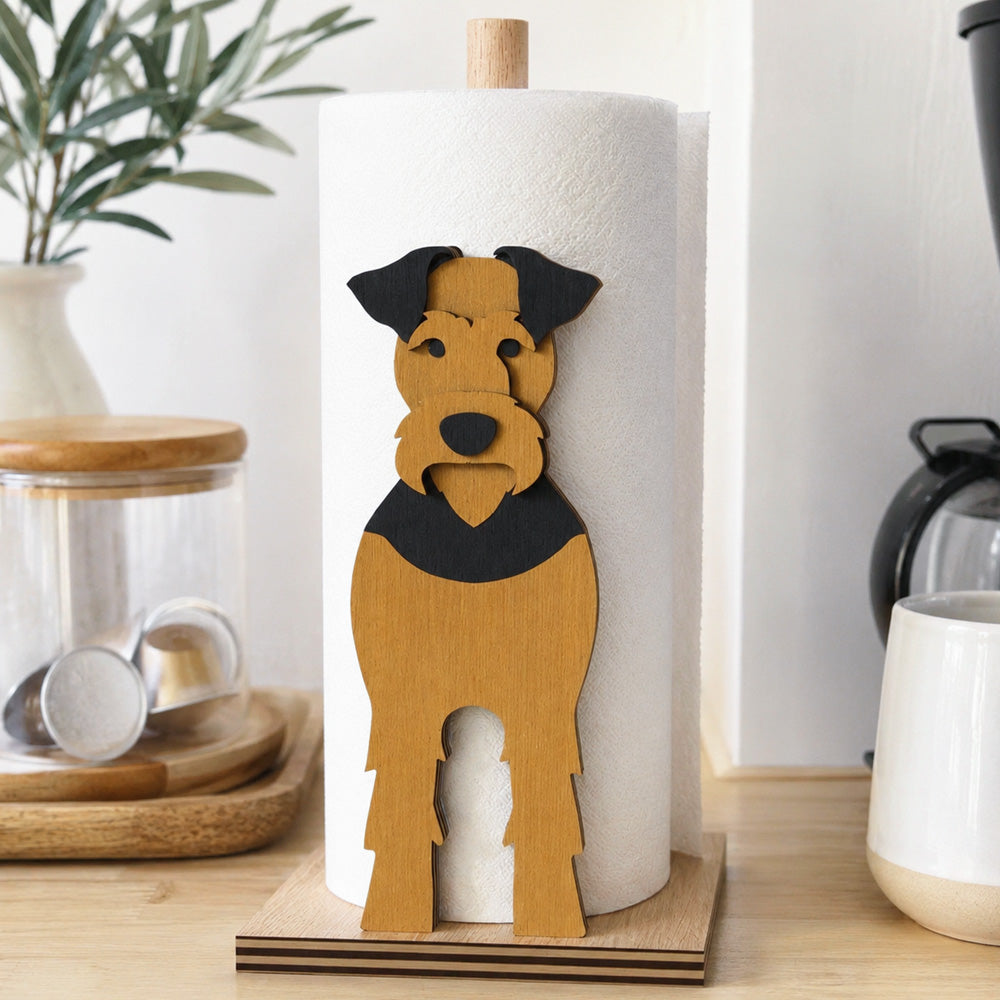 Airedale Terrier Wooden Dog Paper Towel Holder displayed on a kitchen countertop with a freestanding paper towel roll