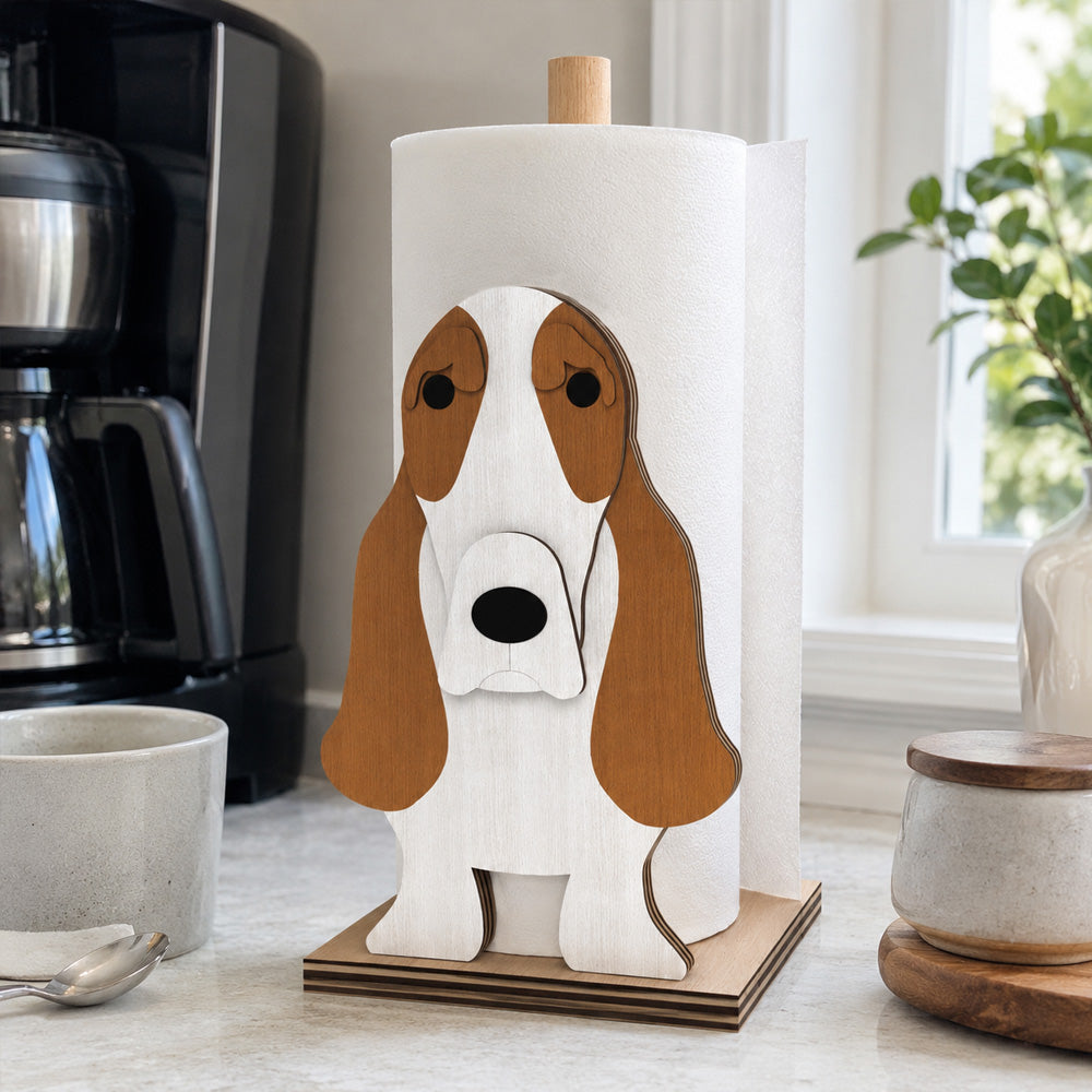 Basset Hound Wooden Dog Paper Towel Holder displayed on a kitchen countertop with a freestanding paper towel roll