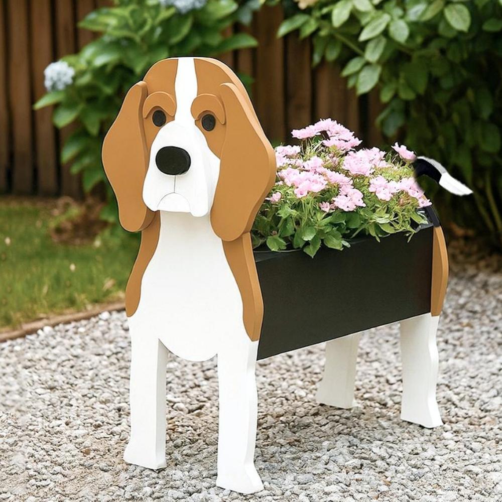 Beagle dog planter filled with fresh flowers is placed in the garden