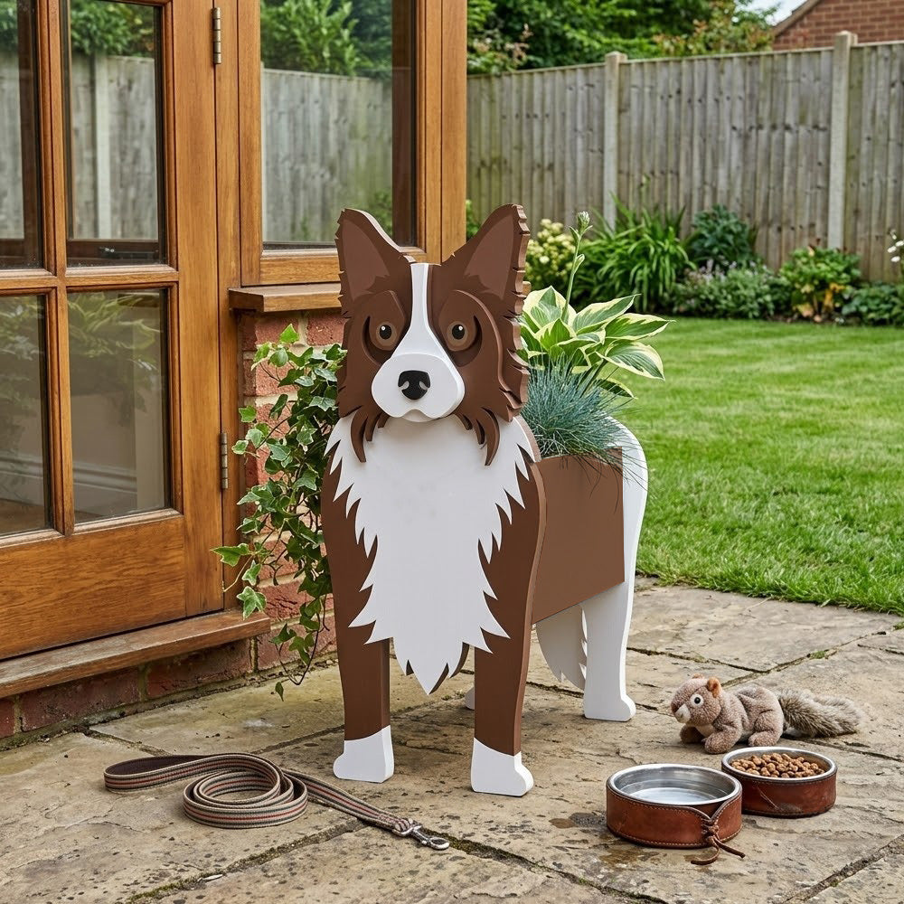 Border Collie dog planter filled with fresh flowers is placed in the garden