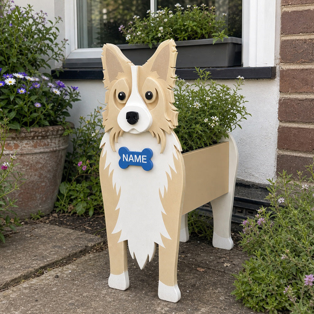 Border Collie dog planter filled with fresh flowers is placed in the garden