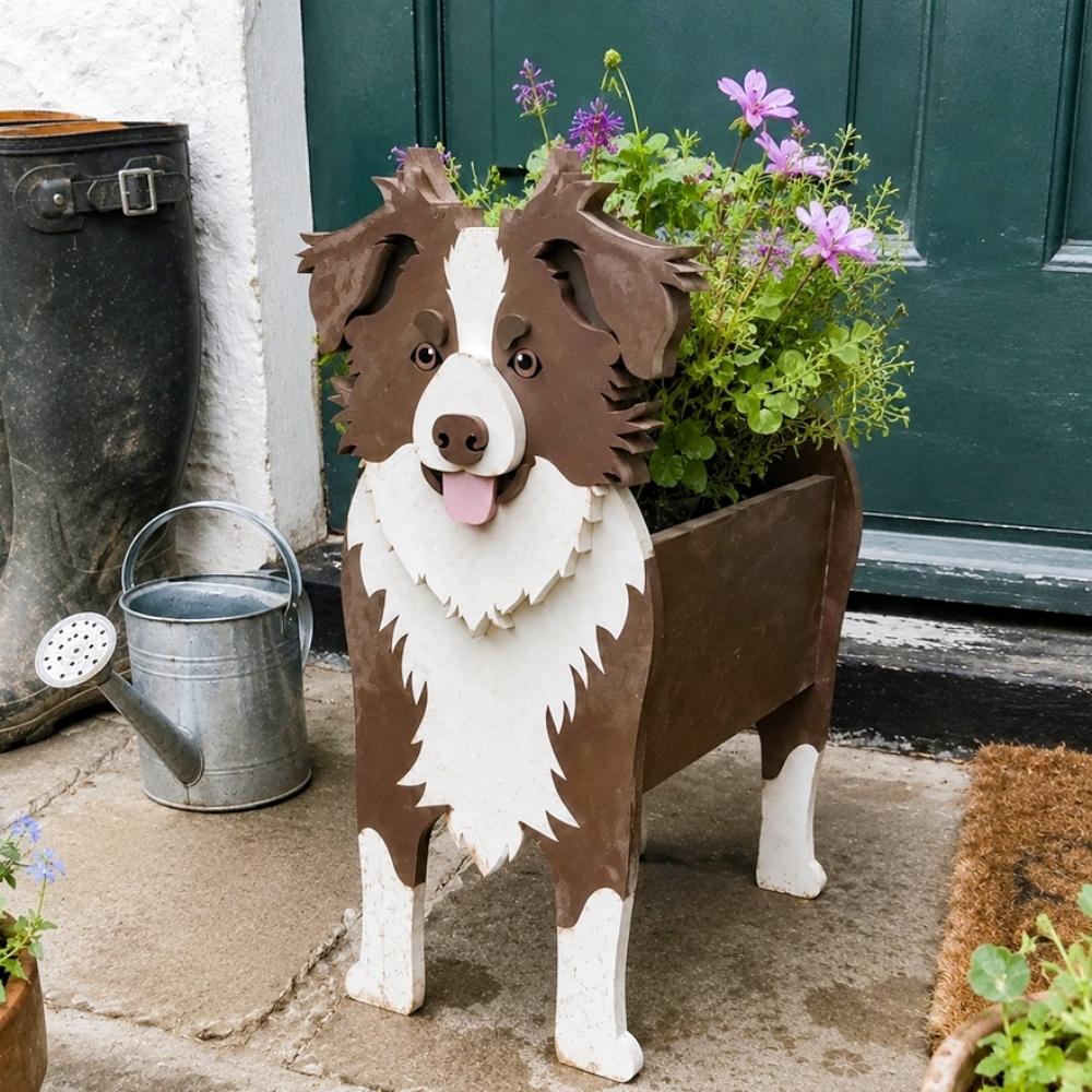 Border Collie dog planter filled with fresh flowers is placed in the garden