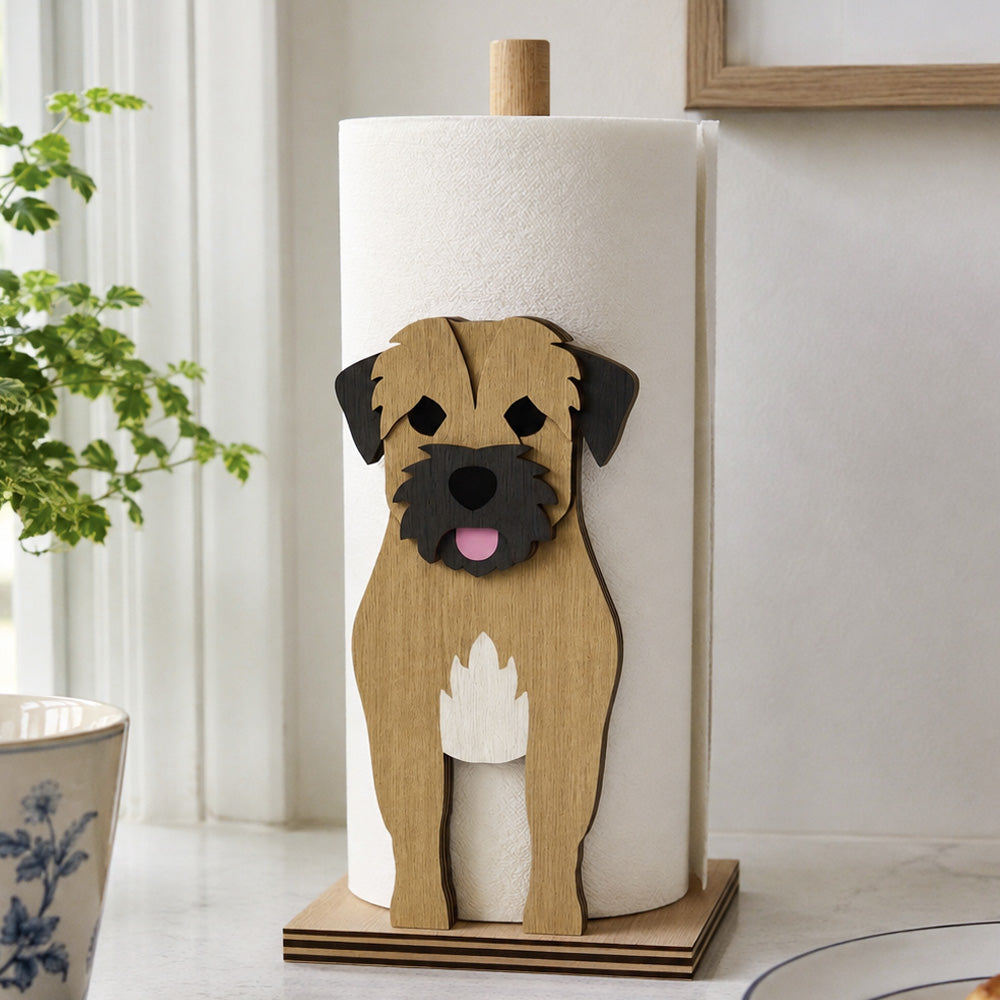 Border Terrier Wooden Dog Paper Towel Holder displayed on a kitchen countertop with a freestanding paper towel roll