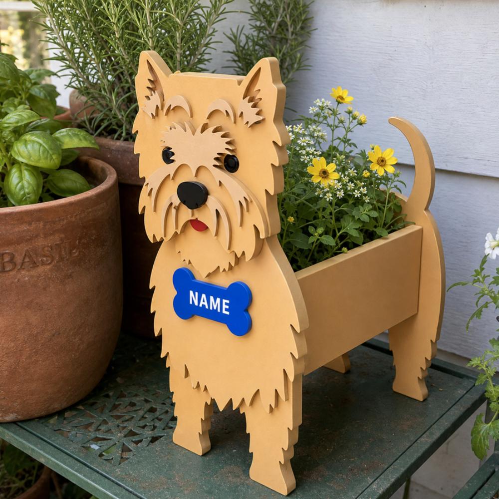 Cairn Terrier dog planter filled with fresh flowers is placed in the garden