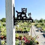 Cairn terrier metal hanging basket bracket mounted on outdoor wall for plant decoration