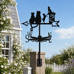 Cat family on chimney metal weather vane with directional arrows and mounting rod, outdoor roof and garden decoration