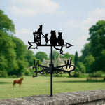 Cat family on chimney metal weather vane with directional arrows and mounting rod, outdoor roof and garden decoration