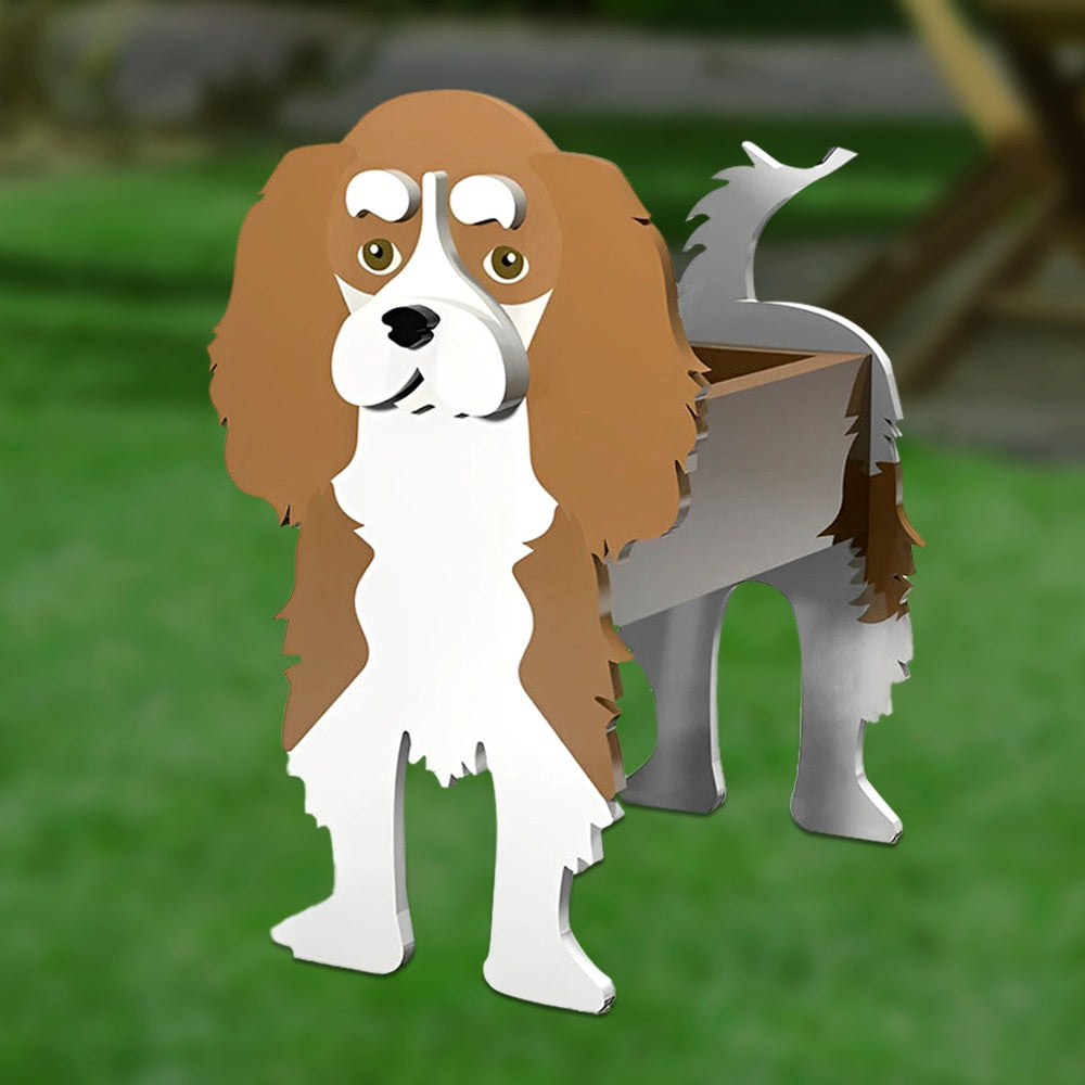 Cavalier King Charles Spaniel dog planter filled with fresh flowers is placed in the garden