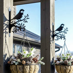 Chickadee bird on branch metal hanging basket bracket mounted on outdoor wall for plant decoration