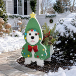 Christmas Doodle dog planter filled with fresh flowers is placed in the garden