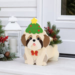 Christmas Shih Tzu dog planter filled with fresh flowers is placed in the garden