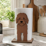 Cockapoo Wooden Dog Paper Towel Holder displayed on a kitchen countertop with a freestanding paper towel roll