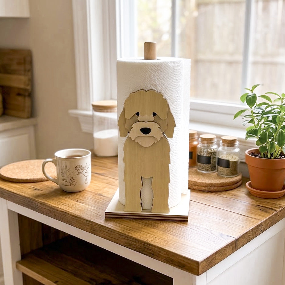Cockapoo Wooden Dog Paper Towel Holder displayed on a kitchen countertop with a freestanding paper towel roll
