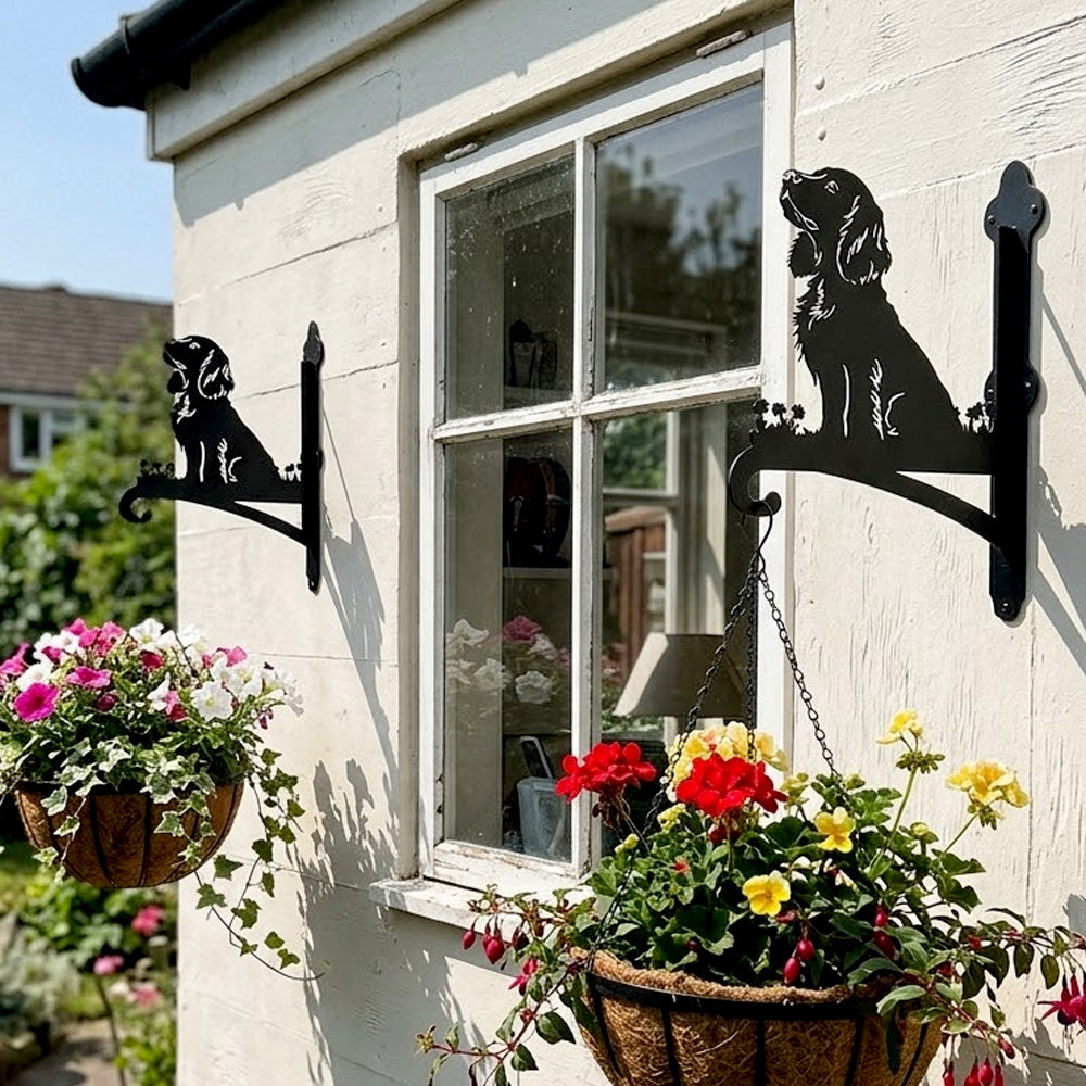 Cocker spaniel metal hanging basket bracket mounted on outdoor wall for plant decoration