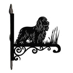 Cocker spaniel metal hanging basket bracket mounted on outdoor wall for plant decoration