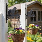 Cocker spaniel metal hanging basket bracket mounted on outdoor wall for plant decoration