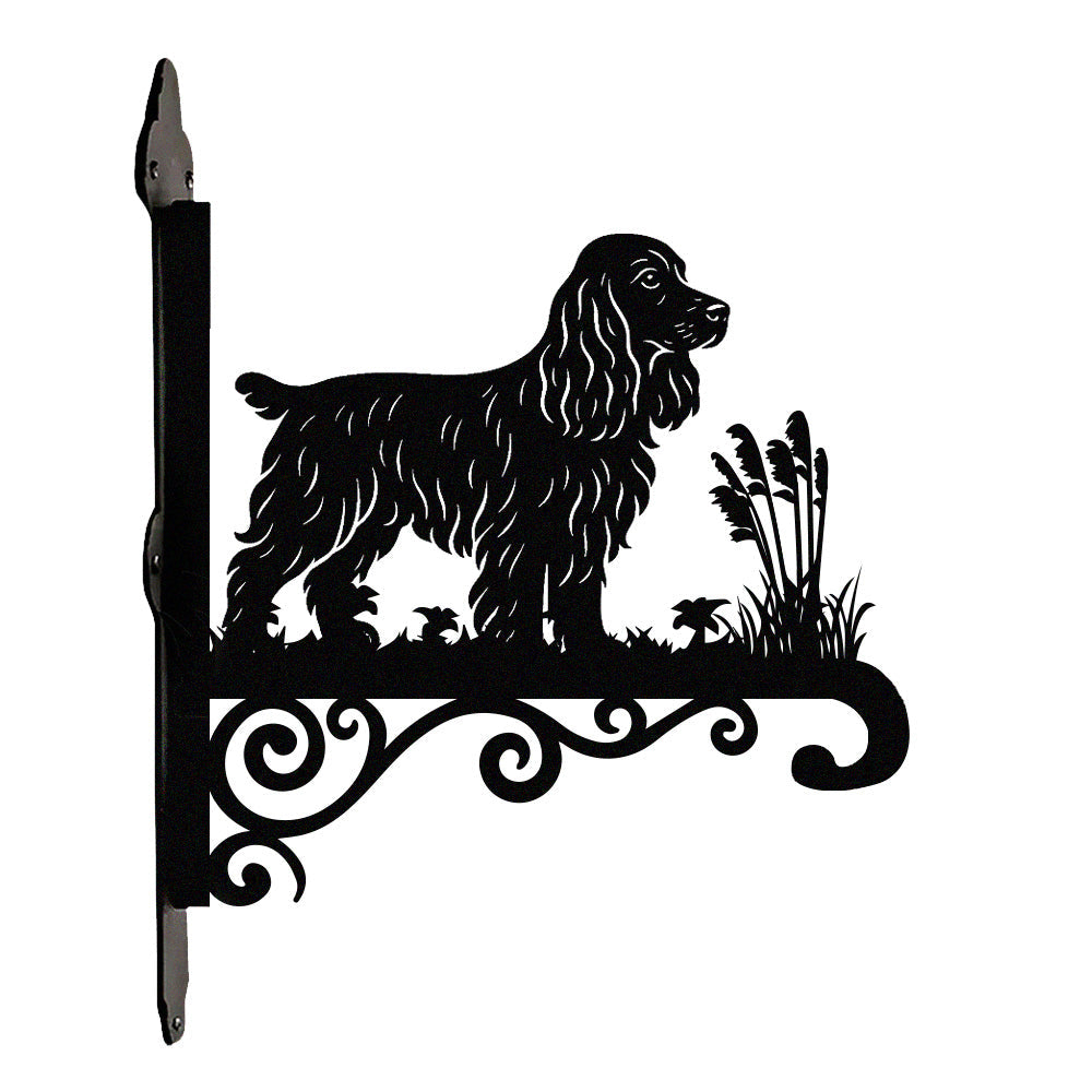 Cocker spaniel metal hanging basket bracket mounted on outdoor wall for plant decoration