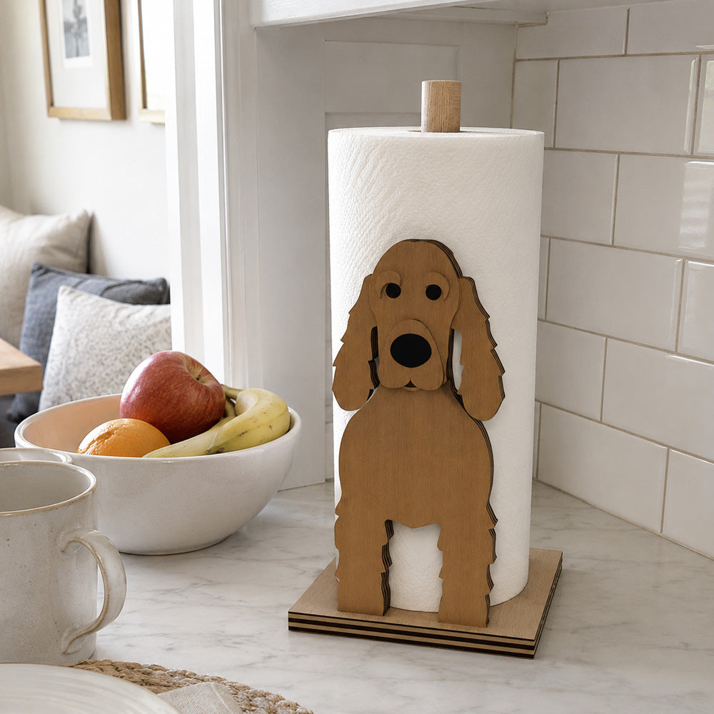 Cocker Spaniel Wooden Dog Paper Towel Holder displayed on a kitchen countertop with a freestanding paper towel roll