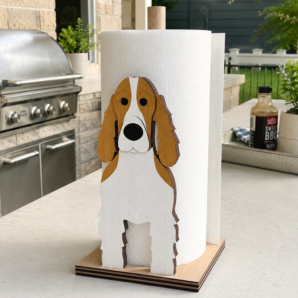 Cocker Spaniel Wooden Dog Paper Towel Holder displayed on a kitchen countertop with a freestanding paper towel roll