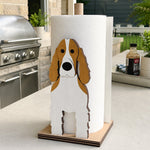 Cocker Spaniel Wooden Dog Paper Towel Holder displayed on a kitchen countertop with a freestanding paper towel roll