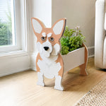 Corgi dog planter filled with fresh flowers is placed in the room