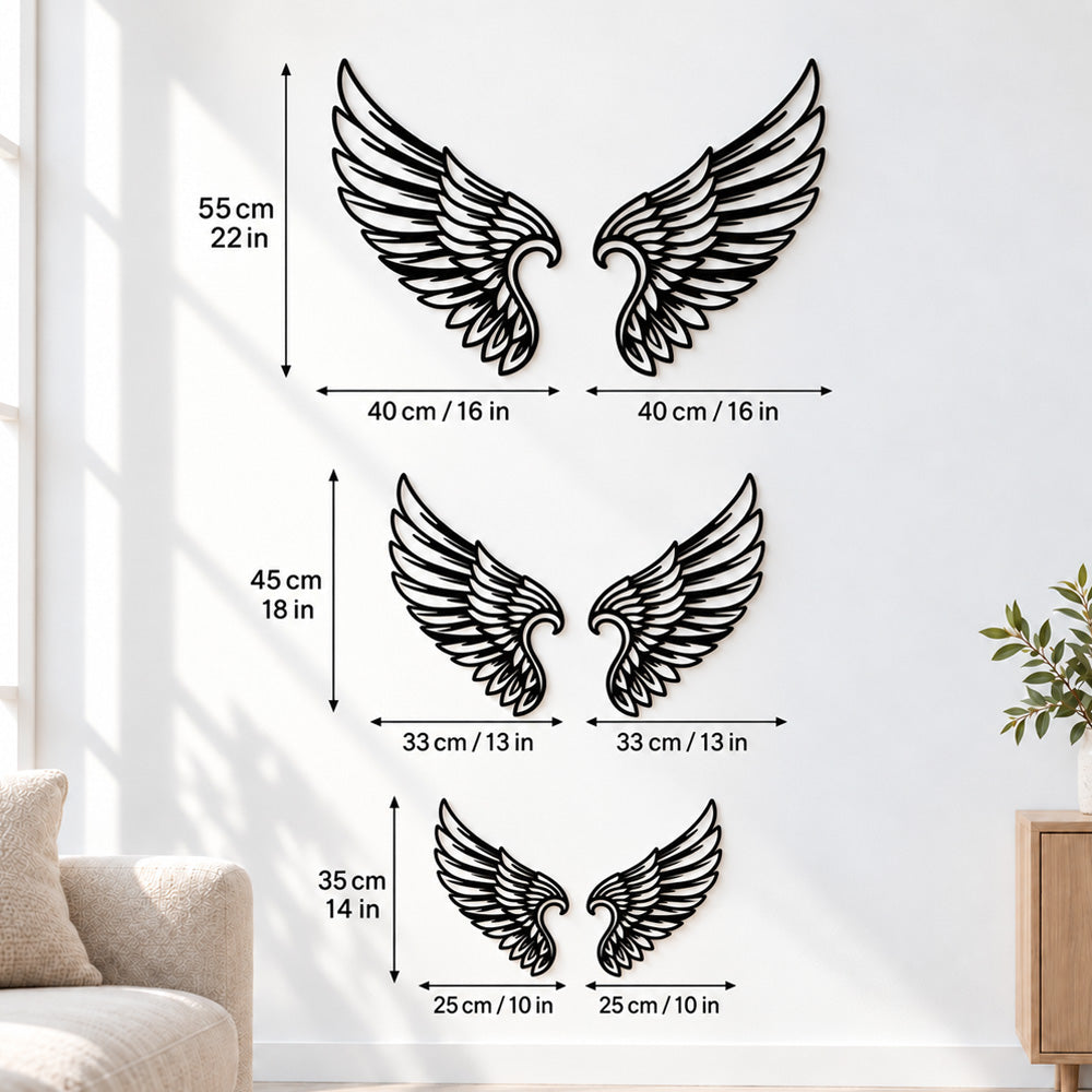 Black metal Cupid Heart wings wall art with intricate cutout details displayed on the wall
