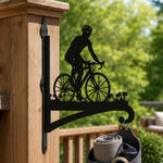 Cyclist riding road bike metal hanging basket bracket mounted on outdoor wall for plant decoration