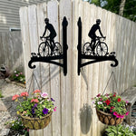 Cyclist riding road bike metal hanging basket bracket mounted on outdoor wall for plant decoration