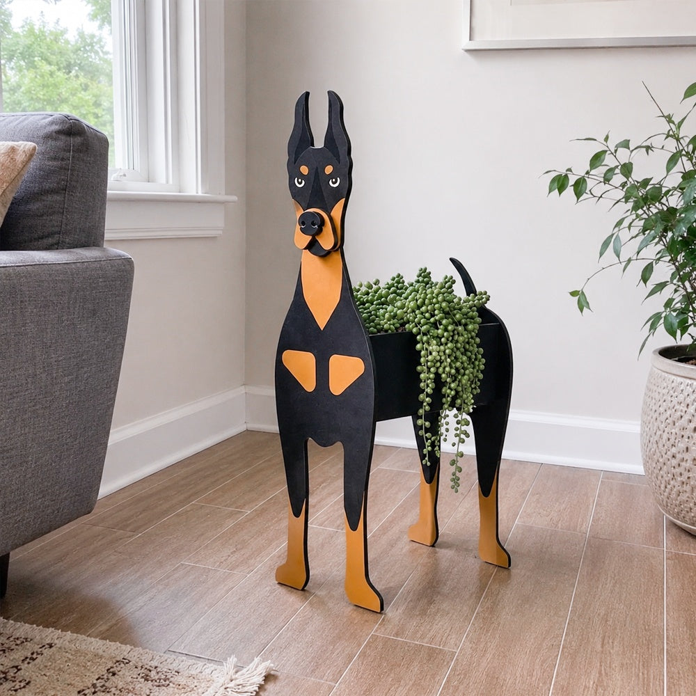 Doberman dog planter filled with fresh flowers is placed in the room