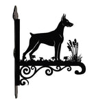 Doberman pinscher metal hanging basket bracket mounted on outdoor wall for plant decoration