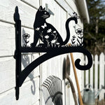 Floral cat and butterfly metal hanging basket bracket mounted on outdoor wall for plant decoration