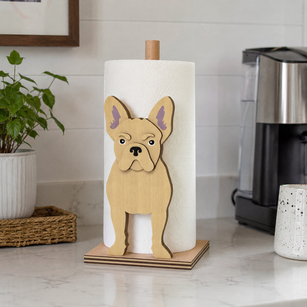 French Bulldog Wooden Dog Paper Towel Holder displayed on a kitchen countertop with a freestanding paper towel roll