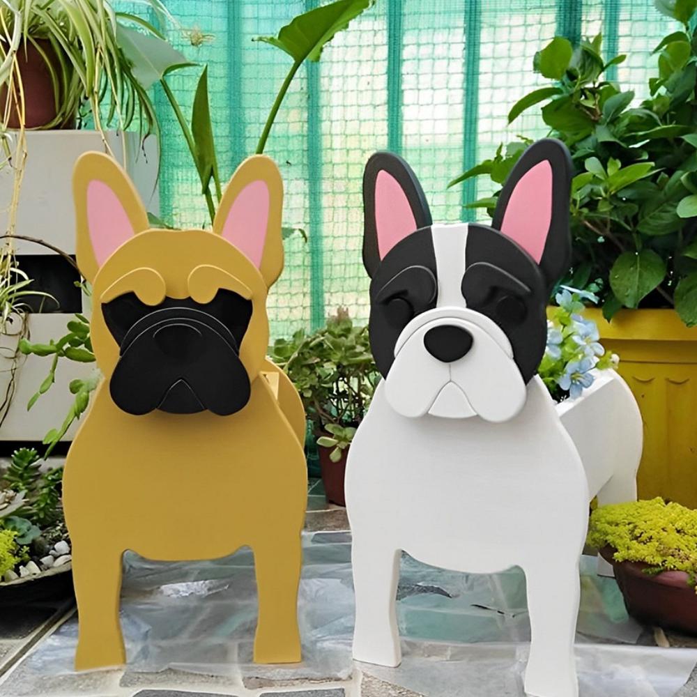French Bulldog planters filled with fresh flowers are placed in the garden