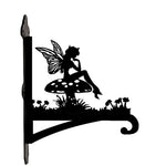 Garden fairy sitting on mushroom metal hanging basket bracket mounted on outdoor wall for plant decoration