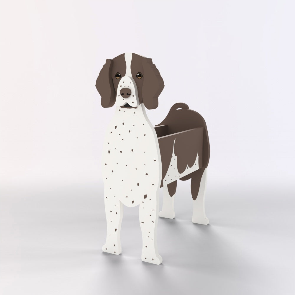 German Shorthaired Pointer dog planter filled with fresh flowers is placed in the garden