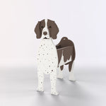 German Shorthaired Pointer dog planter filled with fresh flowers is placed in the garden