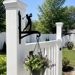 Golf player swinging metal hanging basket bracket mounted on outdoor wall for plant decoration