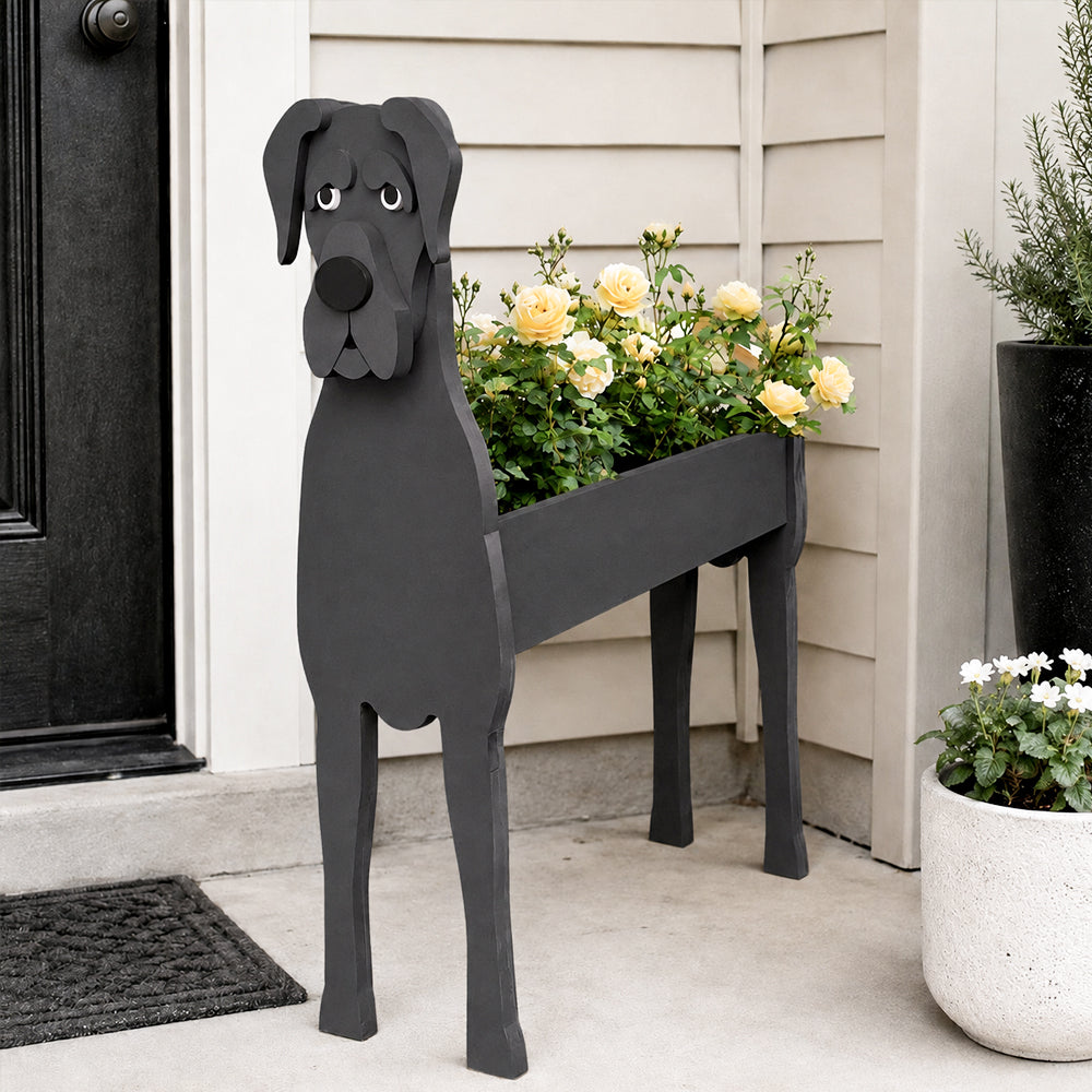 Great Dane dog planter filled with fresh flowers is placed in the garden