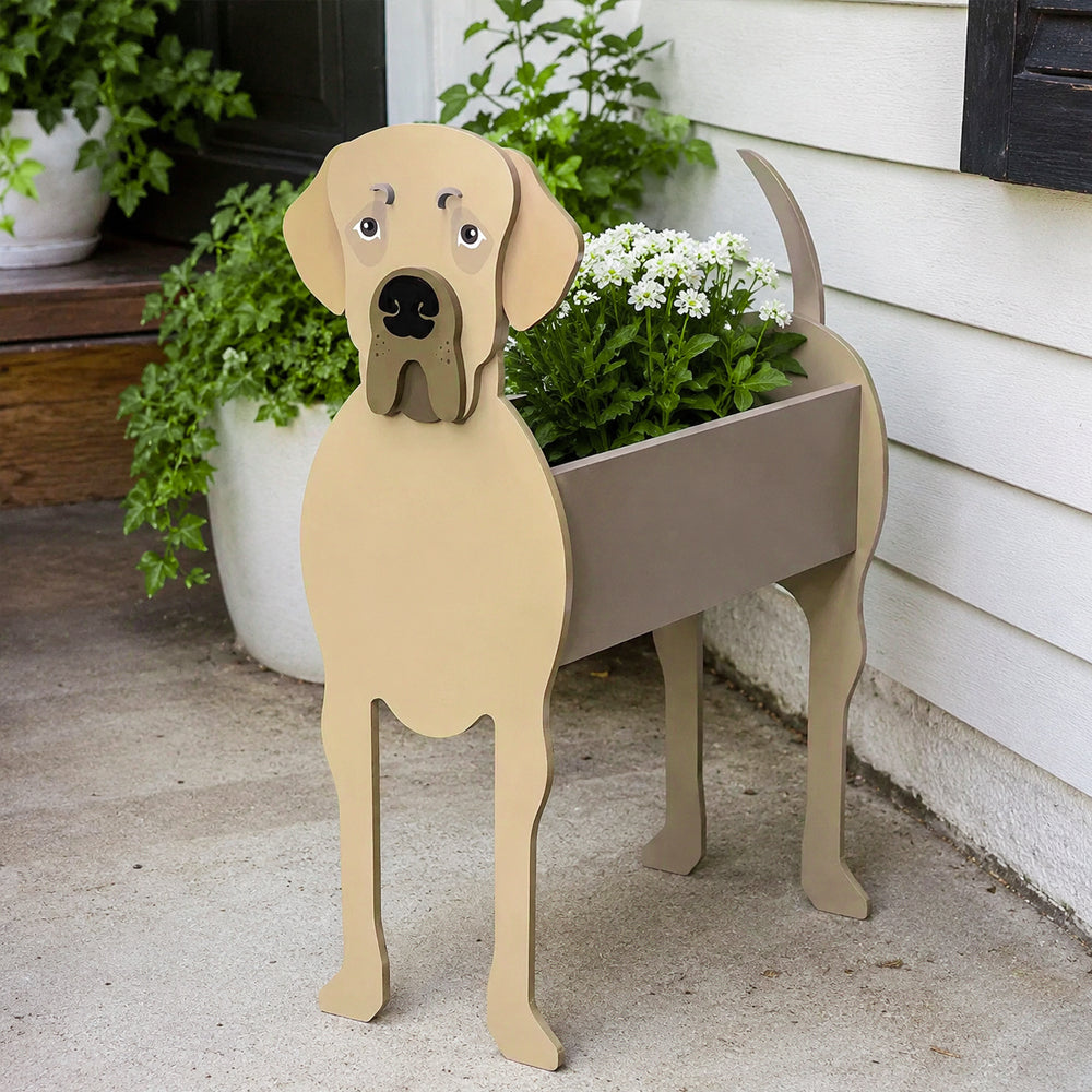 Great Dane dog planter filled with fresh flowers is placed in the garden