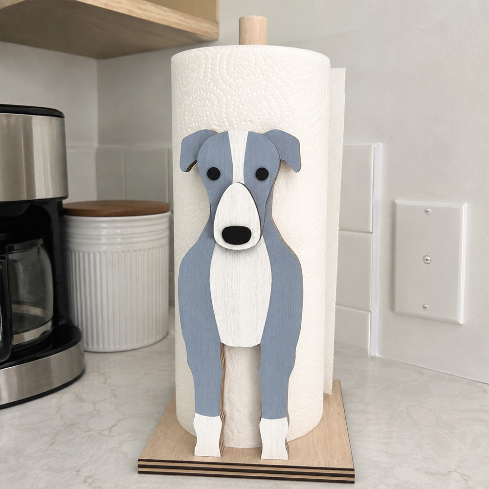 Greyhound Wooden Dog Paper Towel Holder displayed on a kitchen countertop with a freestanding paper towel roll