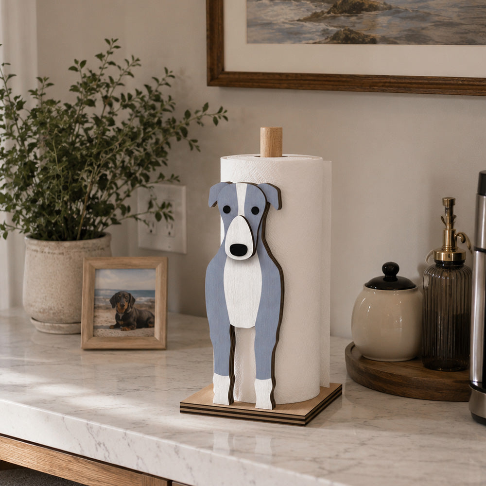 Greyhound Wooden Dog Paper Towel Holder displayed on a kitchen countertop with a freestanding paper towel roll