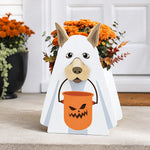 Halloween Ghost Dog Planter filled with fresh flowers is placed in the garden