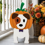 Halloween Jack Russell Terrier Dog Planter filled with fresh flowers is placed in the garden