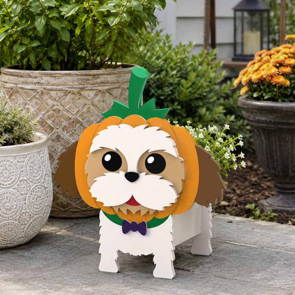 Halloween Shih Tzu Dog Planter filled with fresh flowers is placed in the garden