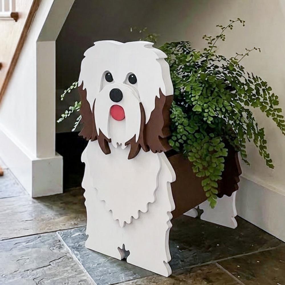 Havanese dog planter filled with fresh flowers is placed in the room
