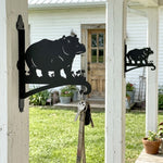 Hippo silhouette metal hanging basket bracket mounted on outdoor wall for plant decoration