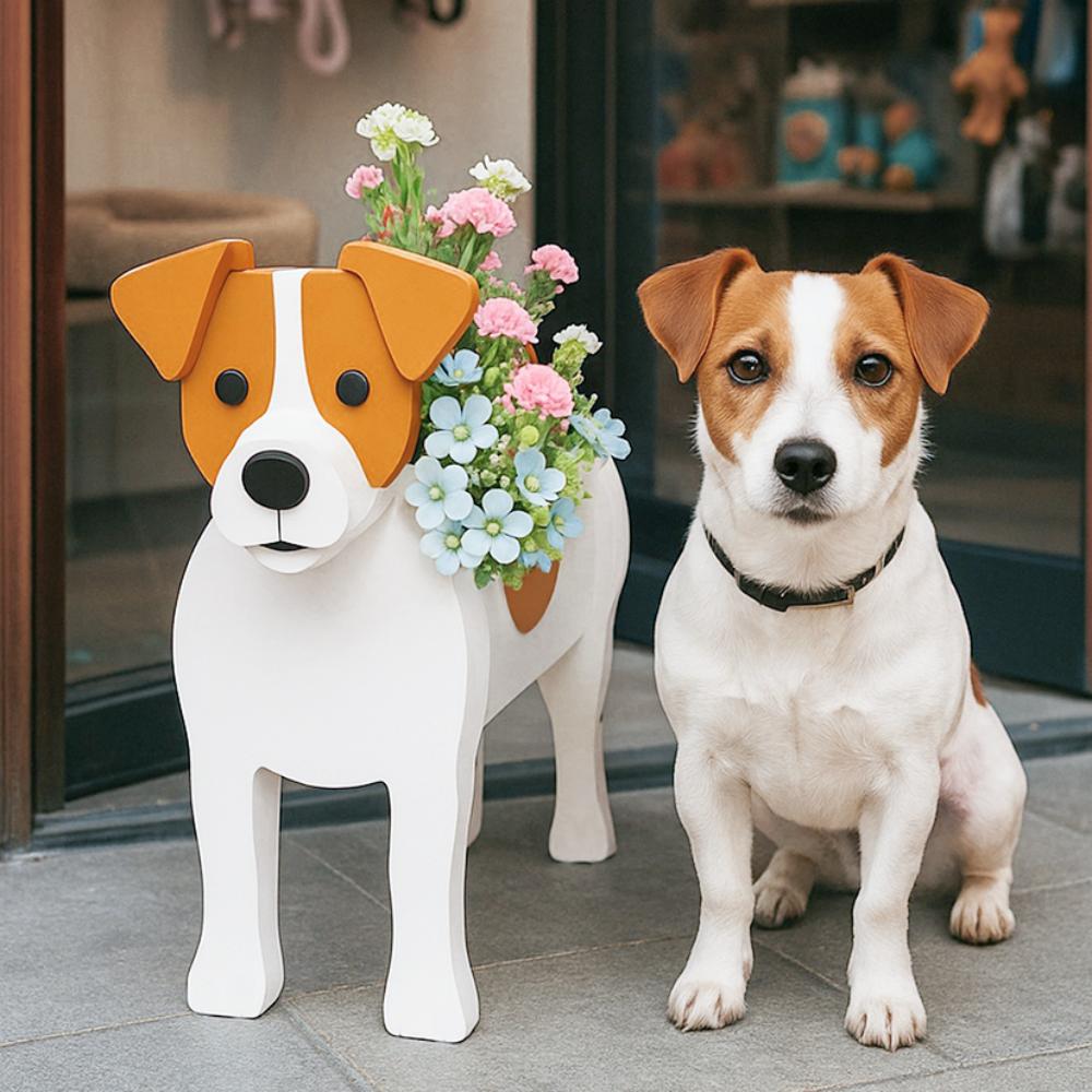 Jack Russell Terrier dog planter filled with fresh flowers is placed in front of the door