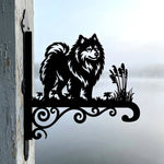 Keeshond metal hanging basket bracket mounted on outdoor wall for plant decoration