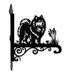 Keeshond metal hanging basket bracket mounted on outdoor wall for plant decoration