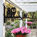 Keeshond metal hanging basket bracket mounted on outdoor wall for plant decoration